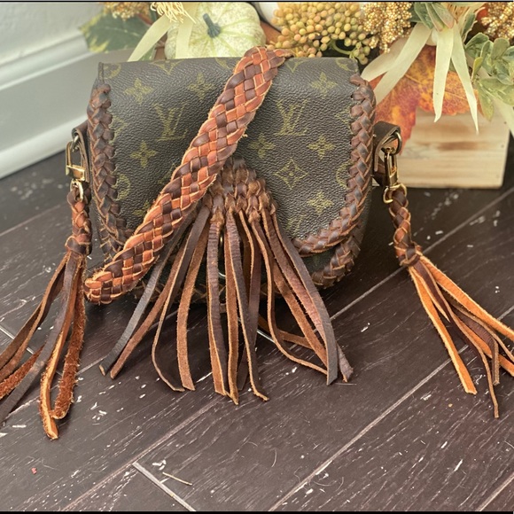 louis vuitton fringe backpack